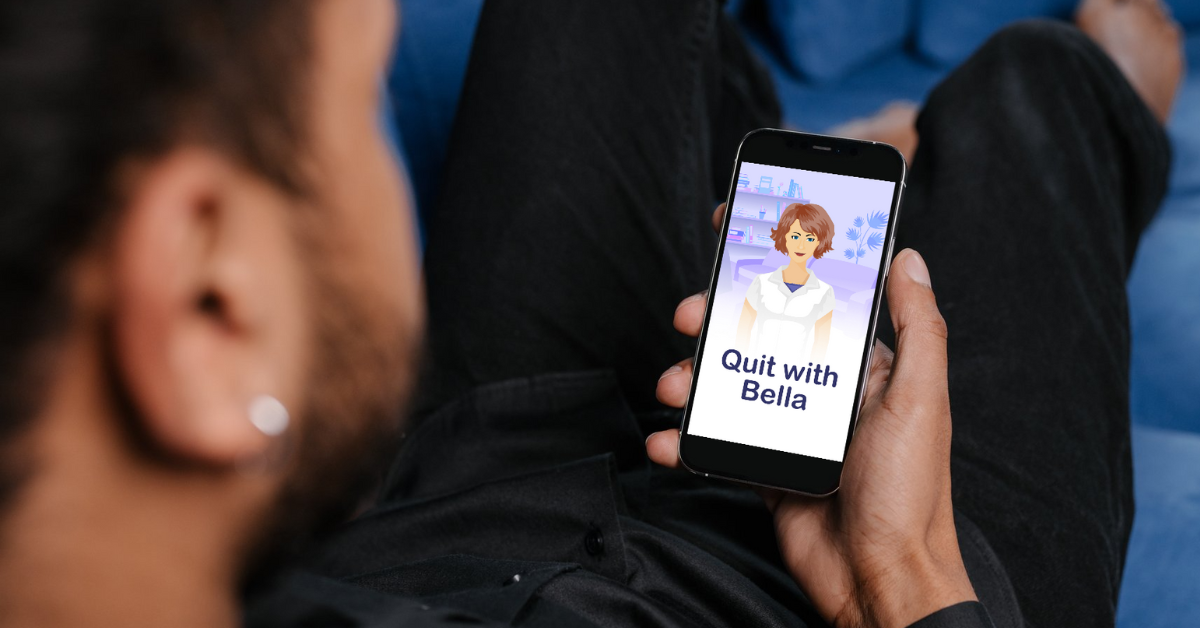 Person holding a mobile phone displaying the quit with bella mobile app